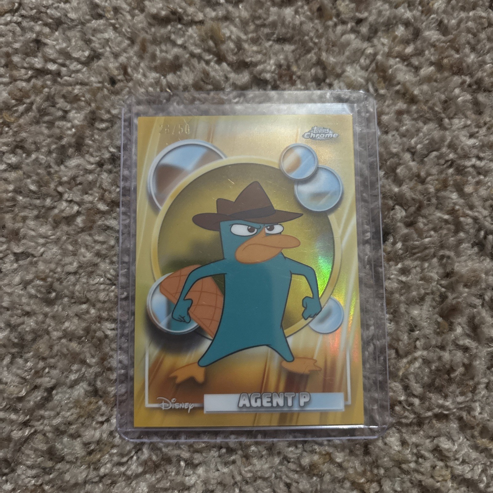 2026 TOPPS CHROME DISNEY #117 AGENT P GOLD REFRACTOR /50 (Perry Phineas & Ferb) 2026 TOPPS CHROME DISNEY #117 AGENT P GOLD REFRACTOR /50 (Perry Phineas & Ferb)