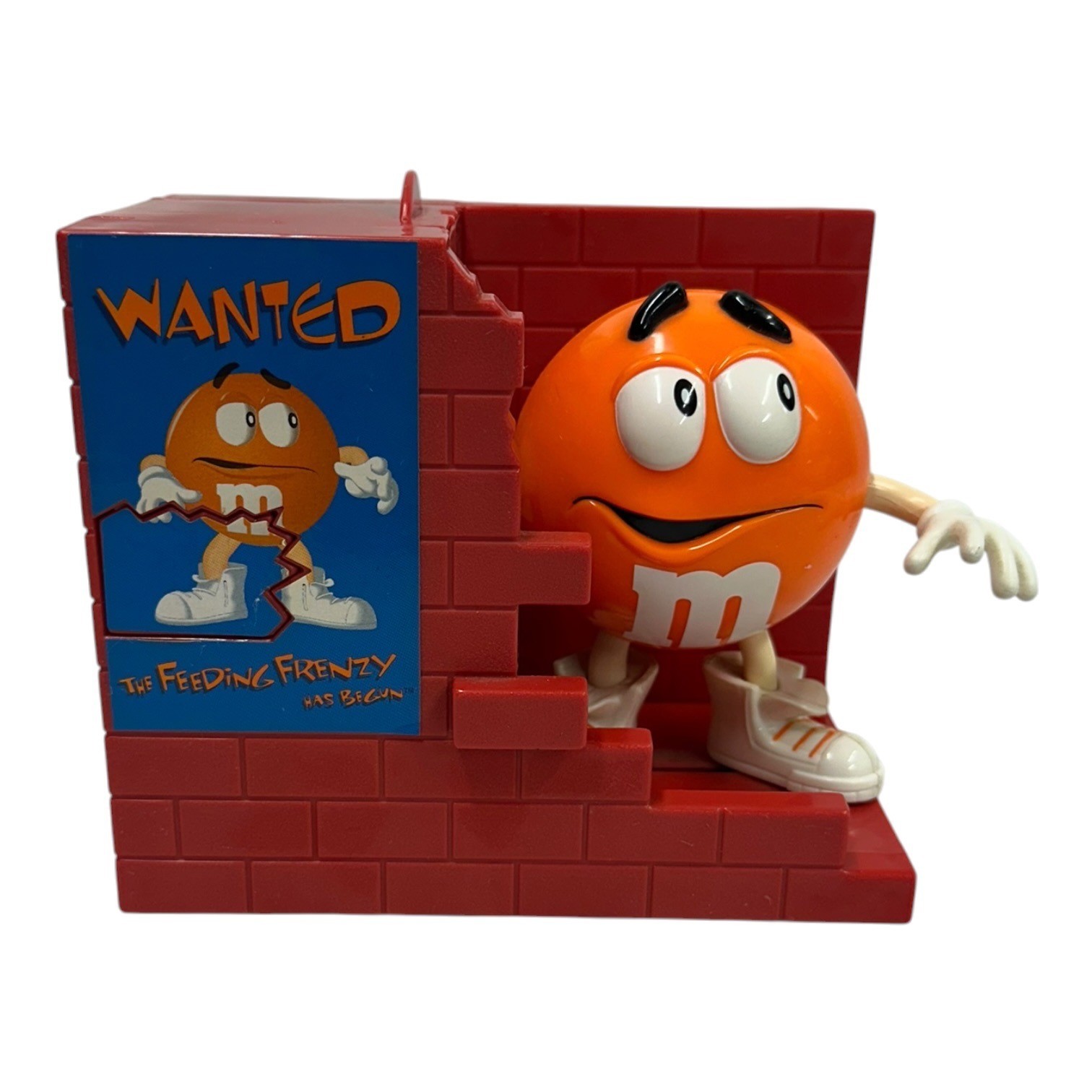 Vintage 1999 M&M Orange Character Candy Dispenser Feeding Frenzy Brick Wall Vintage 1999 M&M Orange Character Candy Dispenser Feeding Frenzy Brick Wall