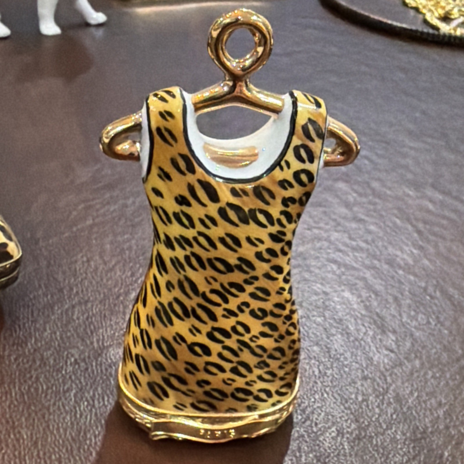 Limoges trinket box animal print dress Ateuer de on gold hanger France Limoges trinket box animal print dress Ateuer de on gold hanger France