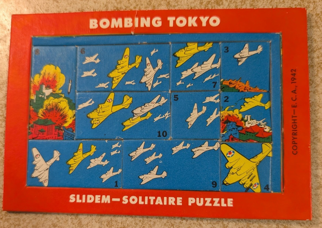 VINTAGE 1942 BOMBING TOKYO SLIDEM SOLITAIRE PUZZLE-NOS- VINTAGE WW2 GAME- RARE VINTAGE 1942 BOMBING TOKYO SLIDEM SOLITAIRE PUZZLE-NOS- VINTAGE WW2 GAME- RARE