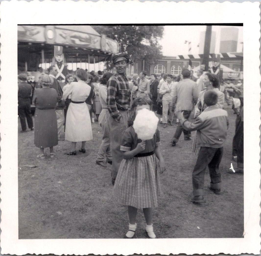 Vintage 1953 Springfield Fair Photo - Girl Eating Cotton Candy, Man in Uniform Vintage 1953 Springfield Fair Photo - Girl Eating Cotton Candy, Man in Uniform