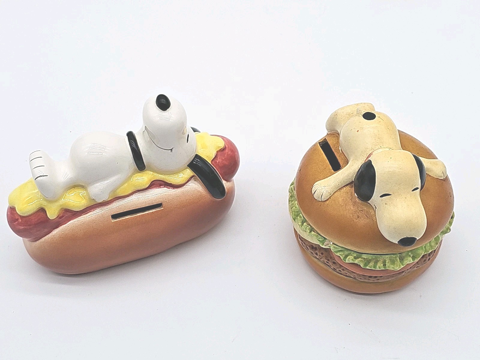 Vintage Snoopy Sitting on a Hot Dog & Hamburger Ceramic Banks United Feature Syn Vintage Snoopy Sitting on a Hot Dog & Hamburger Ceramic Banks United Feature Syn