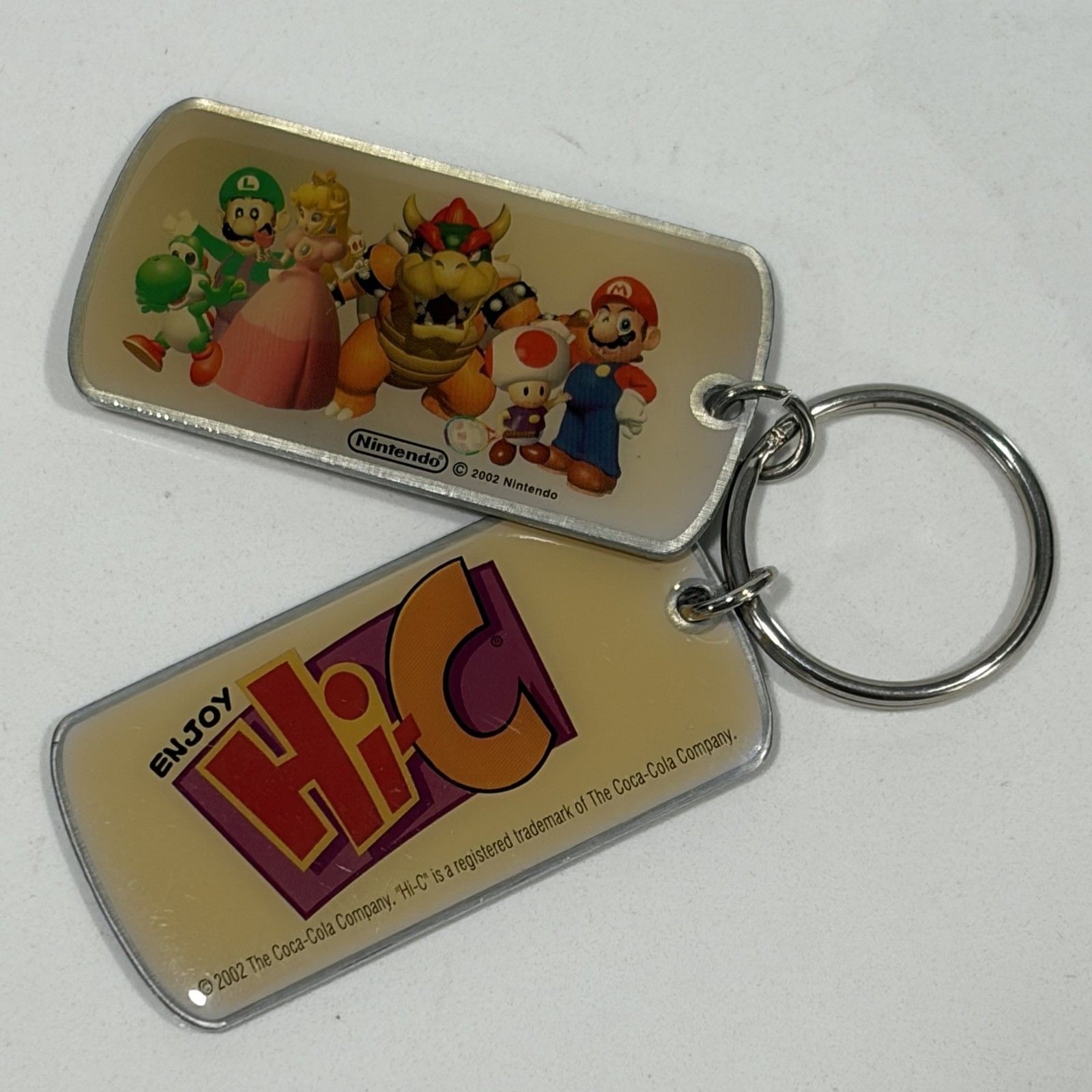 Super Mario Bros Nintendo Hi-C Dog Tags 2002 Keychain Mail-Away Exclusive Super Mario Bros Nintendo Hi-C Dog Tags 2002 Keychain Mail-Away Exclusive