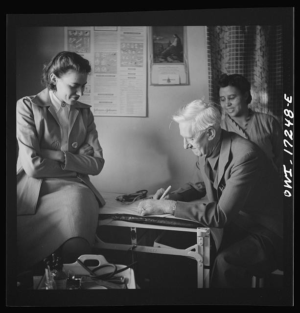 Photo:Penasco New Mexico Doctor Onstine Clinic 1943 Writing Prescription