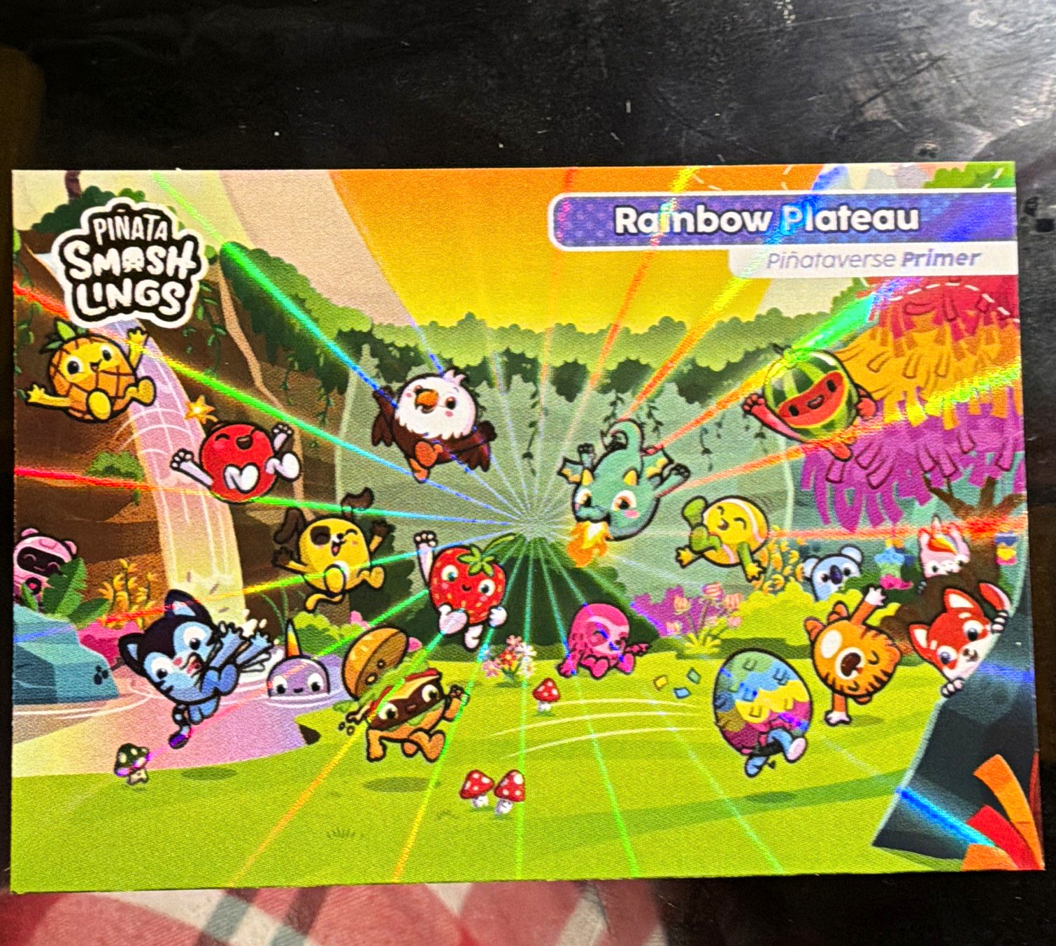2024 Topps Piñata Smashlings Piñataverse Primer #12 Rainbow Plateau Holographic 2024 Topps Piñata Smashlings Piñataverse Primer #12 Rainbow Plateau Holographic