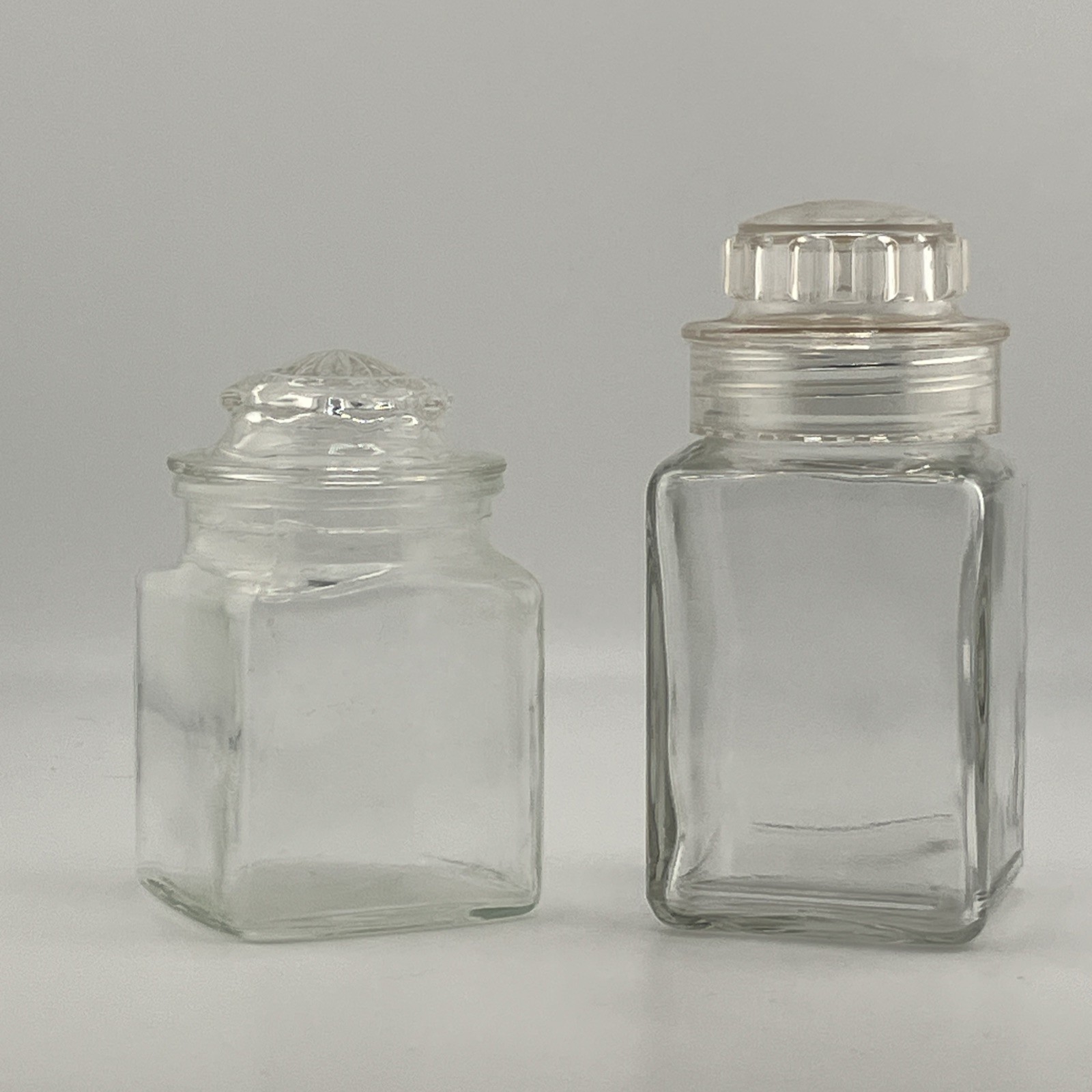 Two Vintage-Style Clear Glass Square Spice Jars With Glass Lids Two Vintage-Style Clear Glass Square Spice Jars With Glass Lids