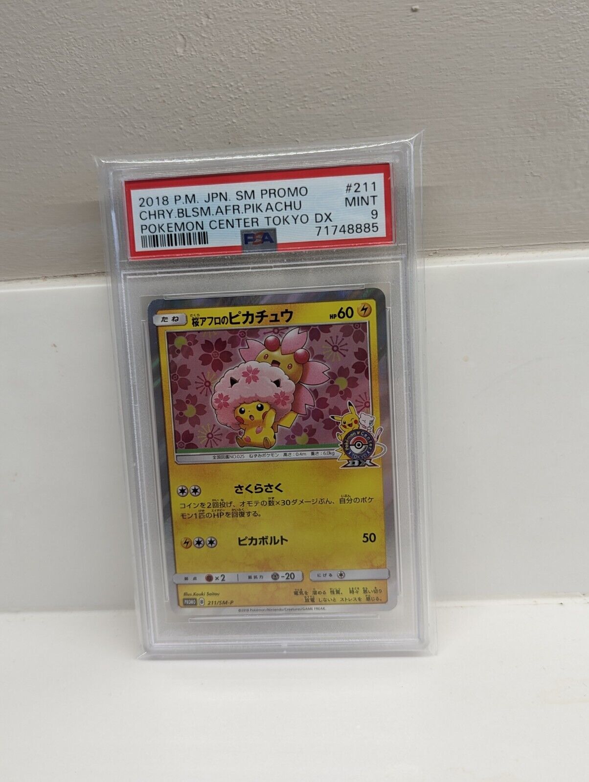 Pikachu Afro Cherry Blossom 211/SM-P Tokyo DX Promo Japanese Pokemon PSA 9 