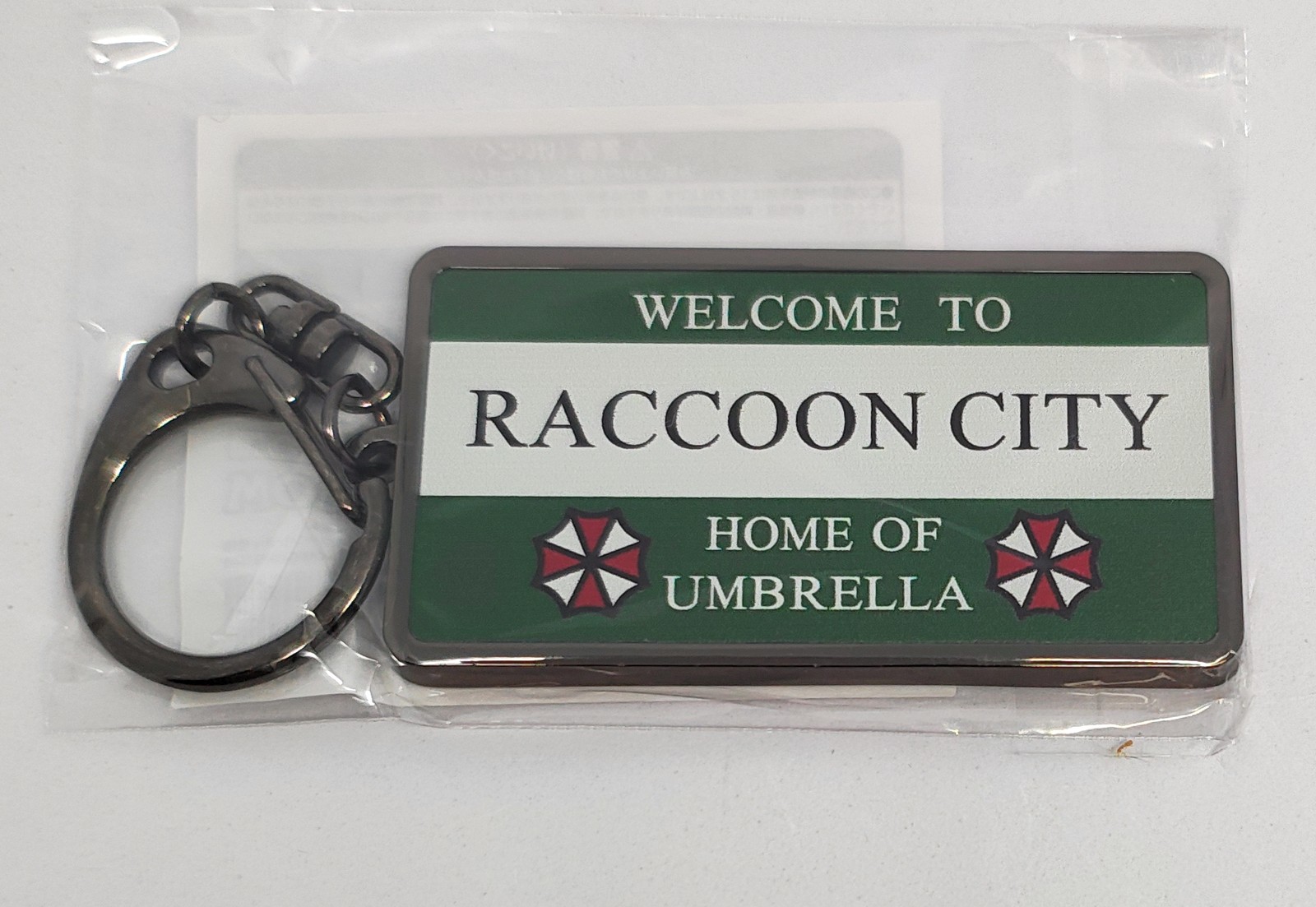Biohazard Resident Evil Requiem Metal Keychain Raccoon City Sign Capcom Biohazard Resident Evil Requiem Metal Keychain Raccoon City Sign Capcom