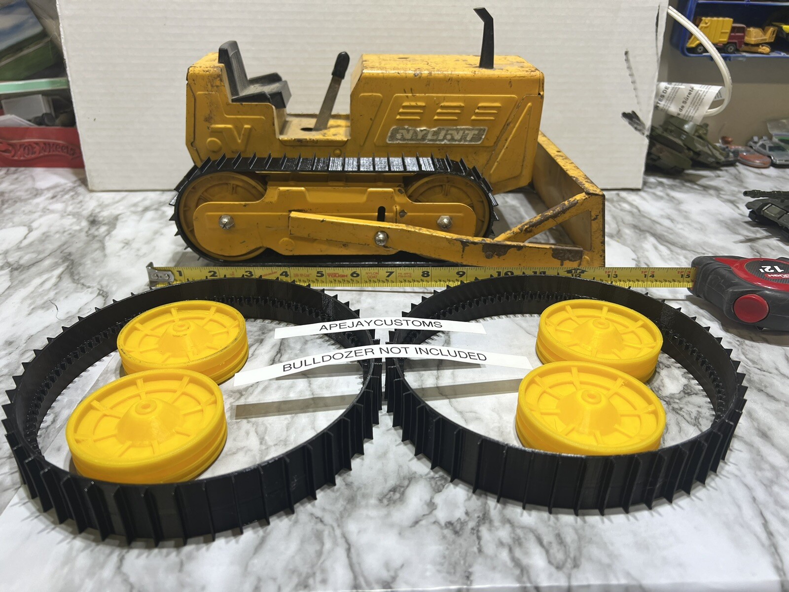 Vintage Nylint Bulldozer Pair of tracks and wheels (TRACKS and Wheels ONLY) Vintage Nylint Bulldozer Pair of tracks and wheels (TRACKS and Wheels ONLY)