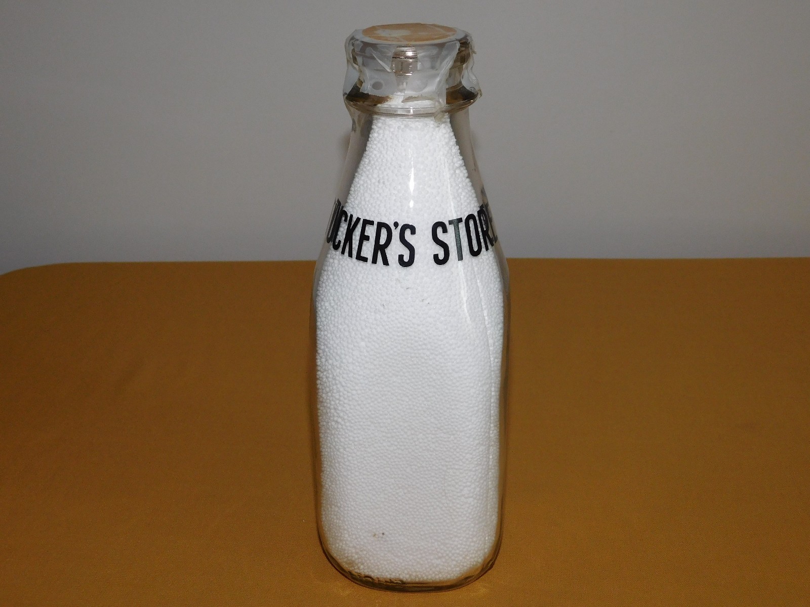 VINTAGE OLD 1956 TUCKER\'S STORE 1 ONE QUART MILK BOTTLE VINTAGE OLD 1956 TUCKER\'S STORE 1 ONE QUART MILK BOTTLE