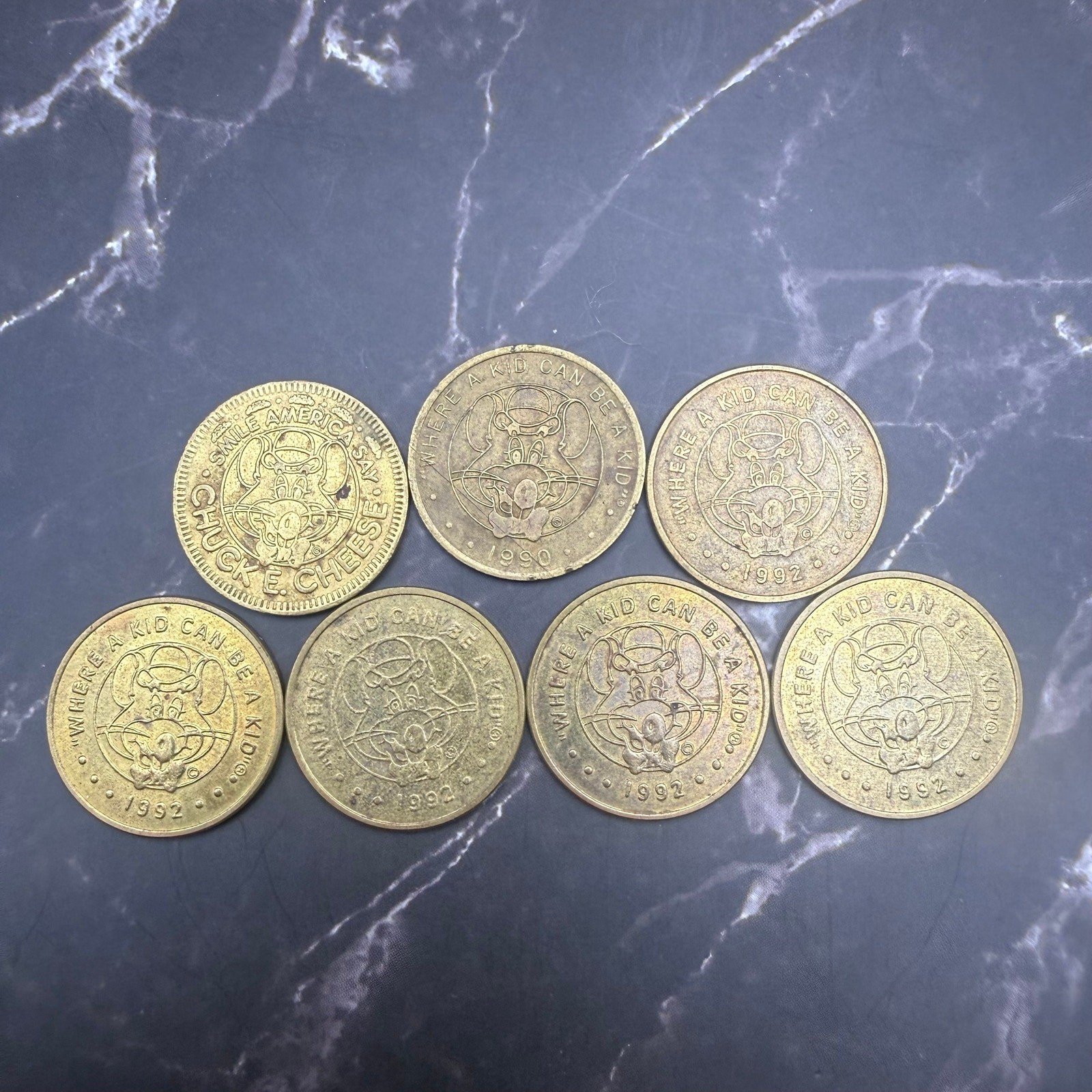 7 Vintage Chuck E Cheese Tokens 1983 1990 1992 Arcade Animatronic Lot 7 Vintage Chuck E Cheese Tokens 1983 1990 1992 Arcade Animatronic Lot