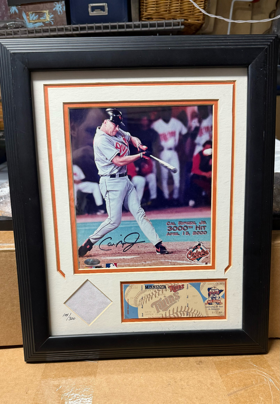Cal Ripken Jr. 3000th Hit Signed Photo with Jersey Piece And Original Ticket Cal Ripken Jr. 3000th Hit Signed Photo with Jersey Piece And Original Ticket
