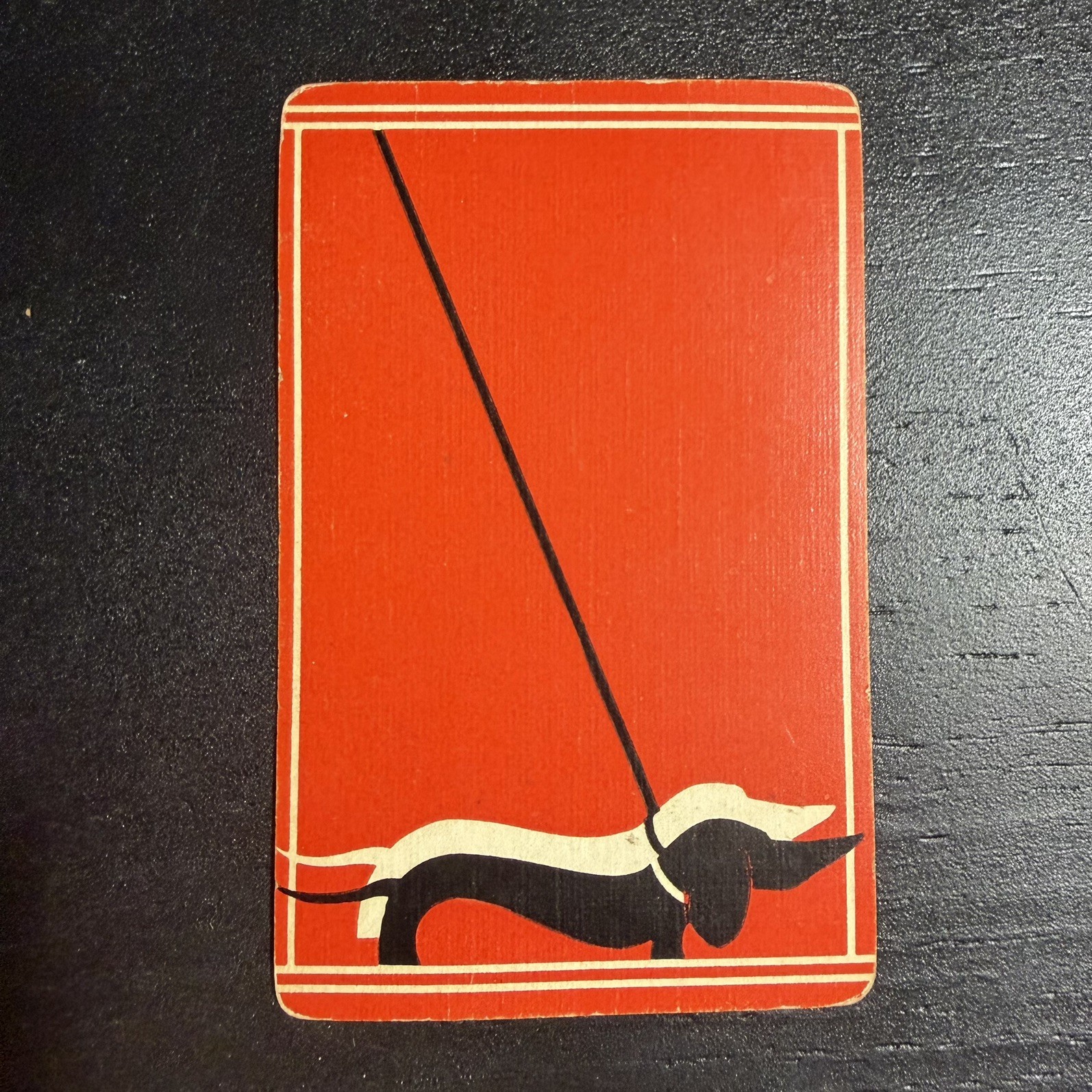 Dachshund Puppy Dog on Leash Single Swap Playing Card, Orange -c. 1930s (Linen) Dachshund Puppy Dog on Leash Single Swap Playing Card, Orange -c. 1930s (Linen)