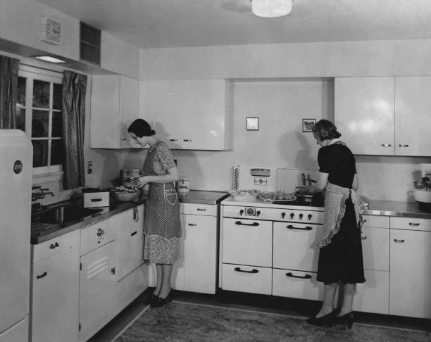 Two women making dinner in the 1940's Historic Old Photo Two women making dinner in the 1940's Historic Old Photo