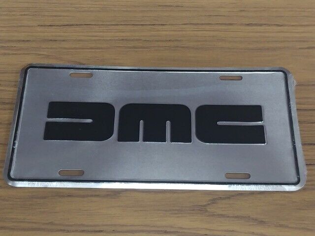 Vintage DMC DeLorean Aluminum embossed dealership license plate 2007