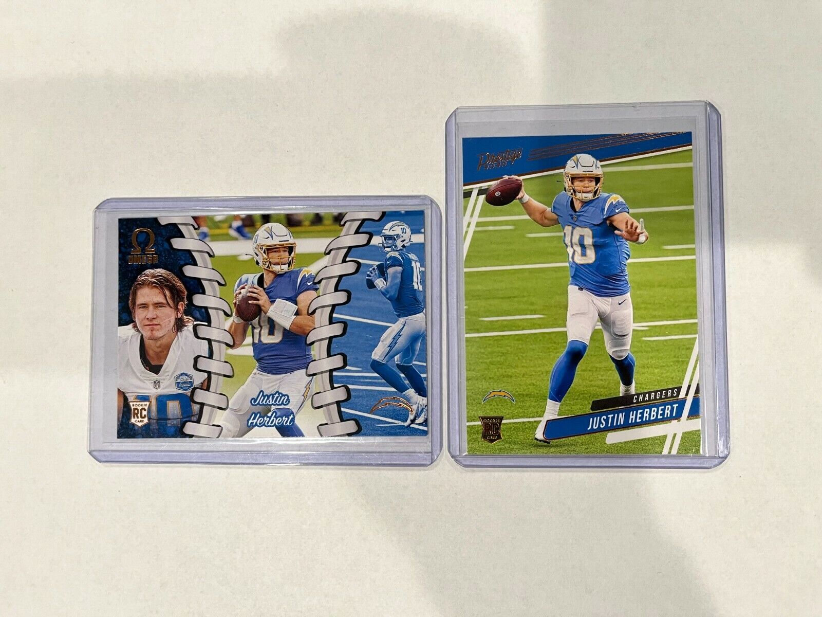 Justin Herbert Rookie Cards Lot of 2 Omega and Prestige