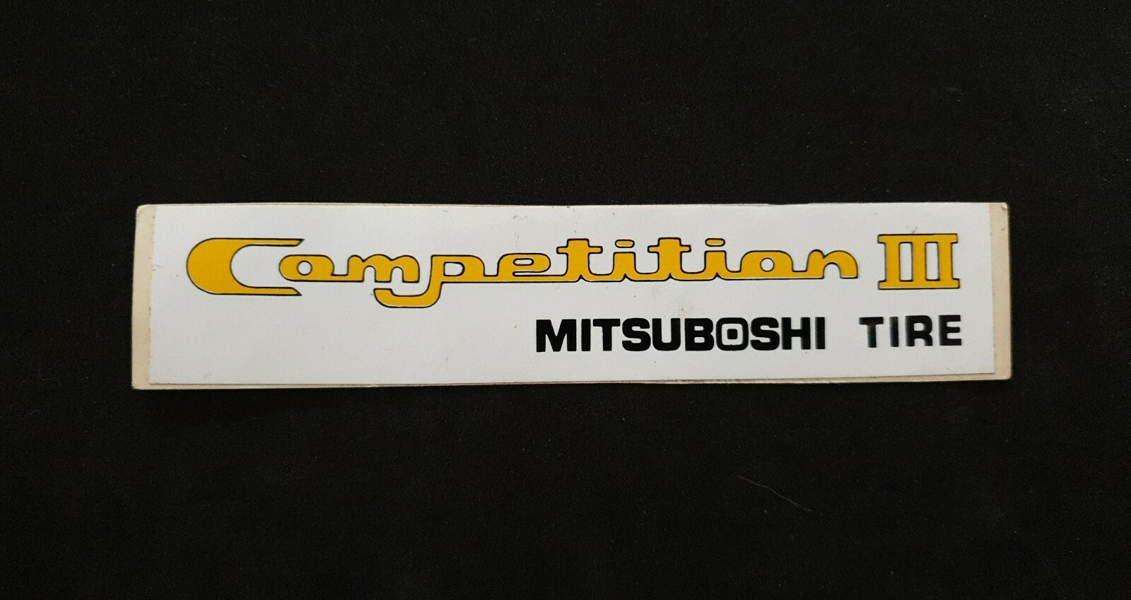 COMPETITION III MITSUBOSHI TIRE Advertising Sticker NEW 14cmx3cm