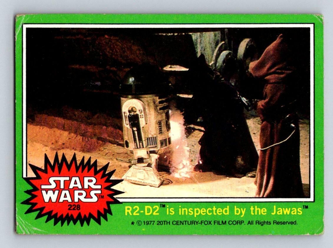 1977 Topps Star Wars #228b R2-D2 is inspected by the Jawas 1977 Topps Star Wars #228b R2-D2 is inspected by the Jawas
