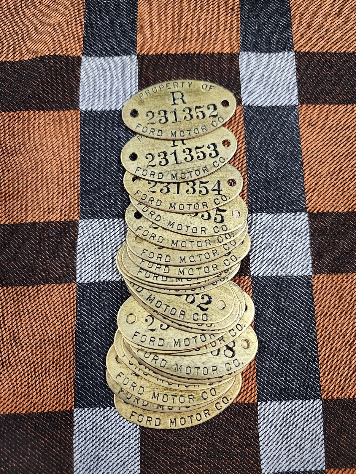 FORD MOTOR CO RETIRED BRASS TAG 2 FORD MOTOR CO RETIRED BRASS TAG 2