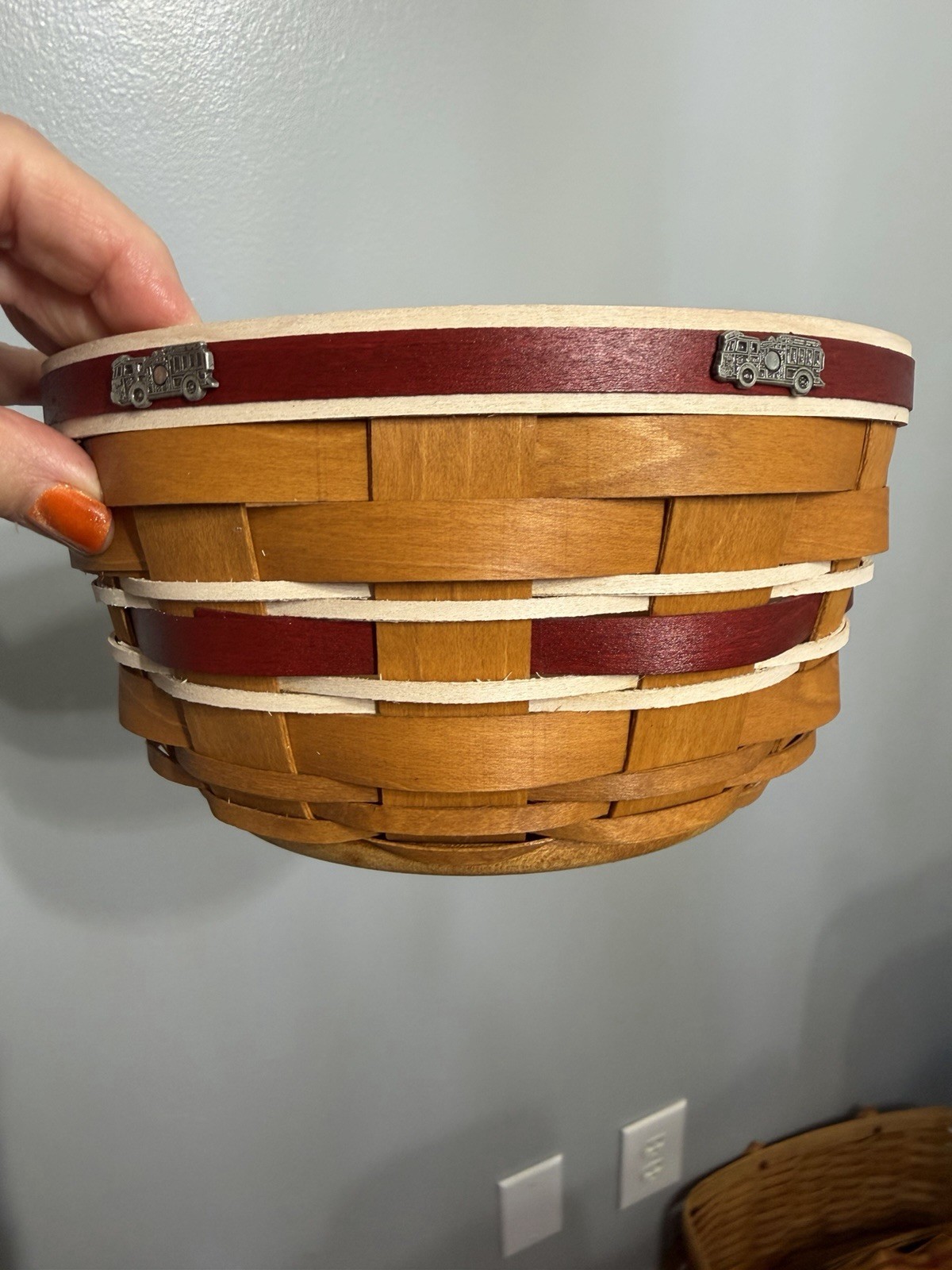 Extremely rare longaberger basket with firetrucks around the rim. Extremely rare longaberger basket with firetrucks around the rim.