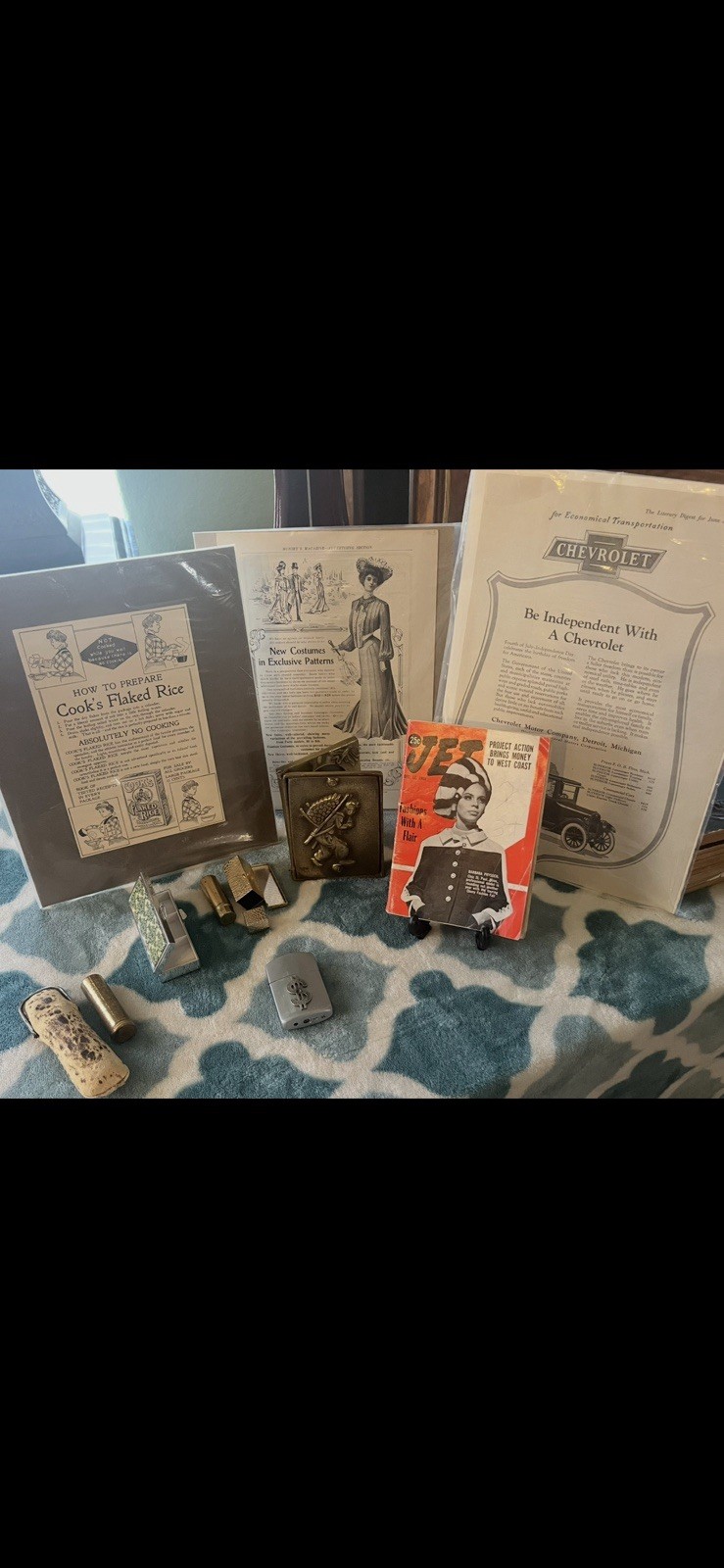 Antique women’s lot including - Chevrolet Ad, Jet Magazine, Lighters, Korea