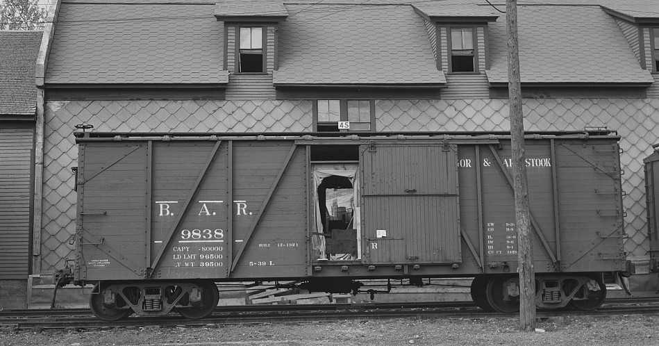 A car of the Bangor & Aroostook Railroad at a potato storehouse 1940 8.5 x 11