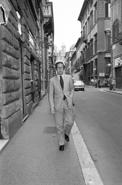 Italian dressmaker Gianni Battistoni posing in front of his atelie- Old Photo