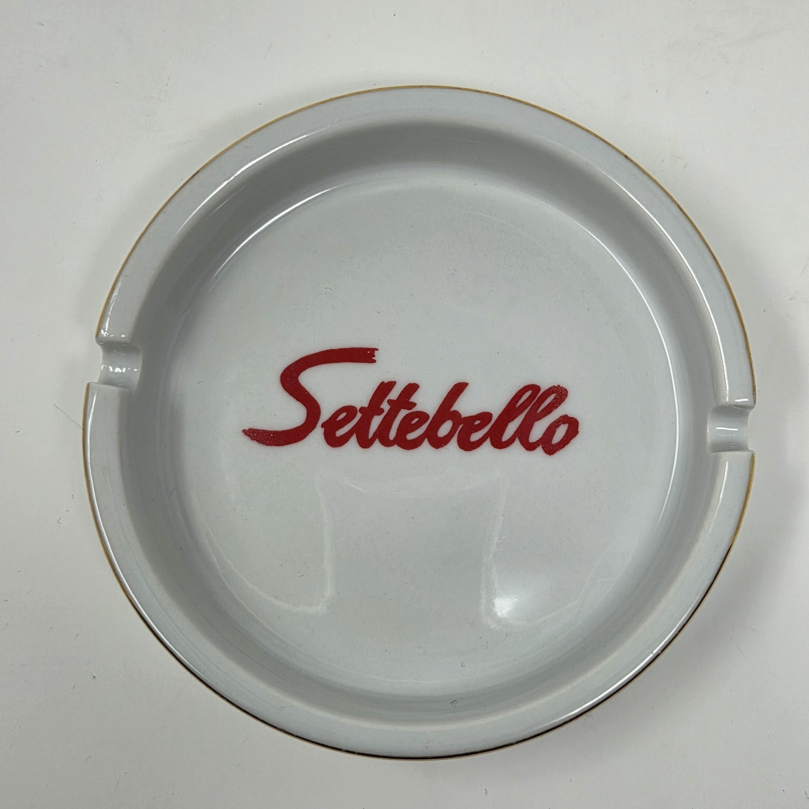 Settebello White Ceramic Ashtray w/ Red Logo & Gold Trim Accent Design Settebello White Ceramic Ashtray w/ Red Logo & Gold Trim Accent Design