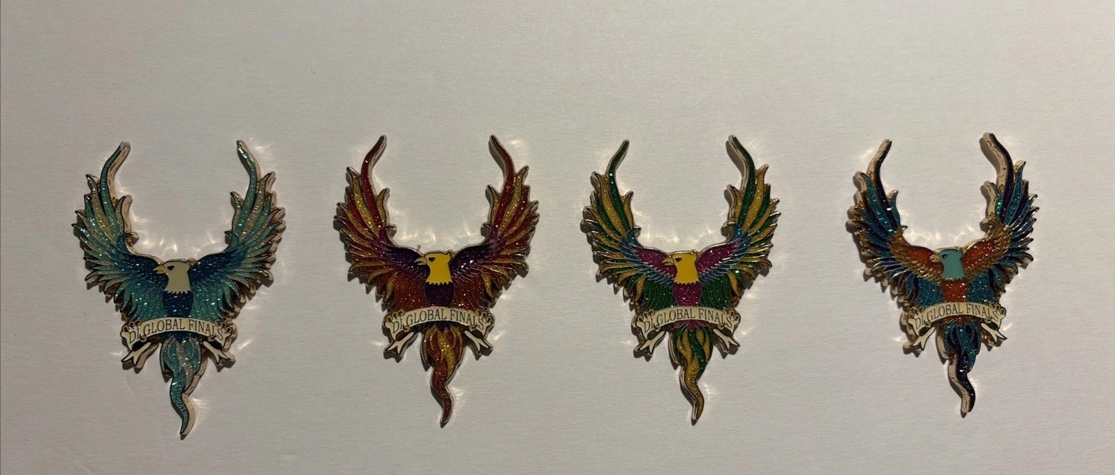 Destination Imagination Global Finals Phoenix Glitter Pin Set Rare (4 Pins) Destination Imagination Global Finals Phoenix Glitter Pin Set Rare (4 Pins)
