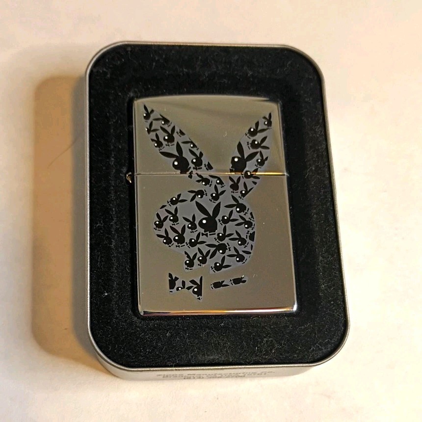 Zippo Playboy Rabbits Silver & Black Pocket Lighter w/ Tin & Box Zippo Playboy Rabbits Silver & Black Pocket Lighter w/ Tin & Box