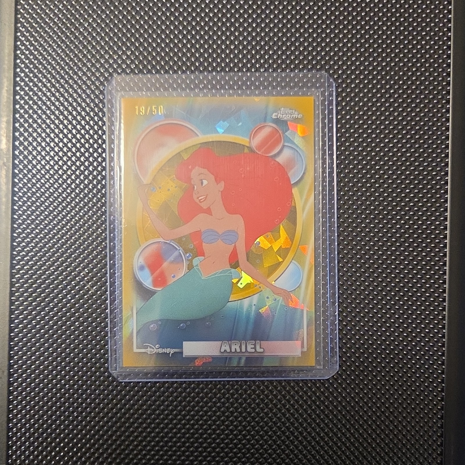 Topps 2026 Chrome Sapphire Disney Ariel #106 Serial Numbered 19/50 (PR 50) Topps 2026 Chrome Sapphire Disney Ariel #106 Serial Numbered 19/50 (PR 50)