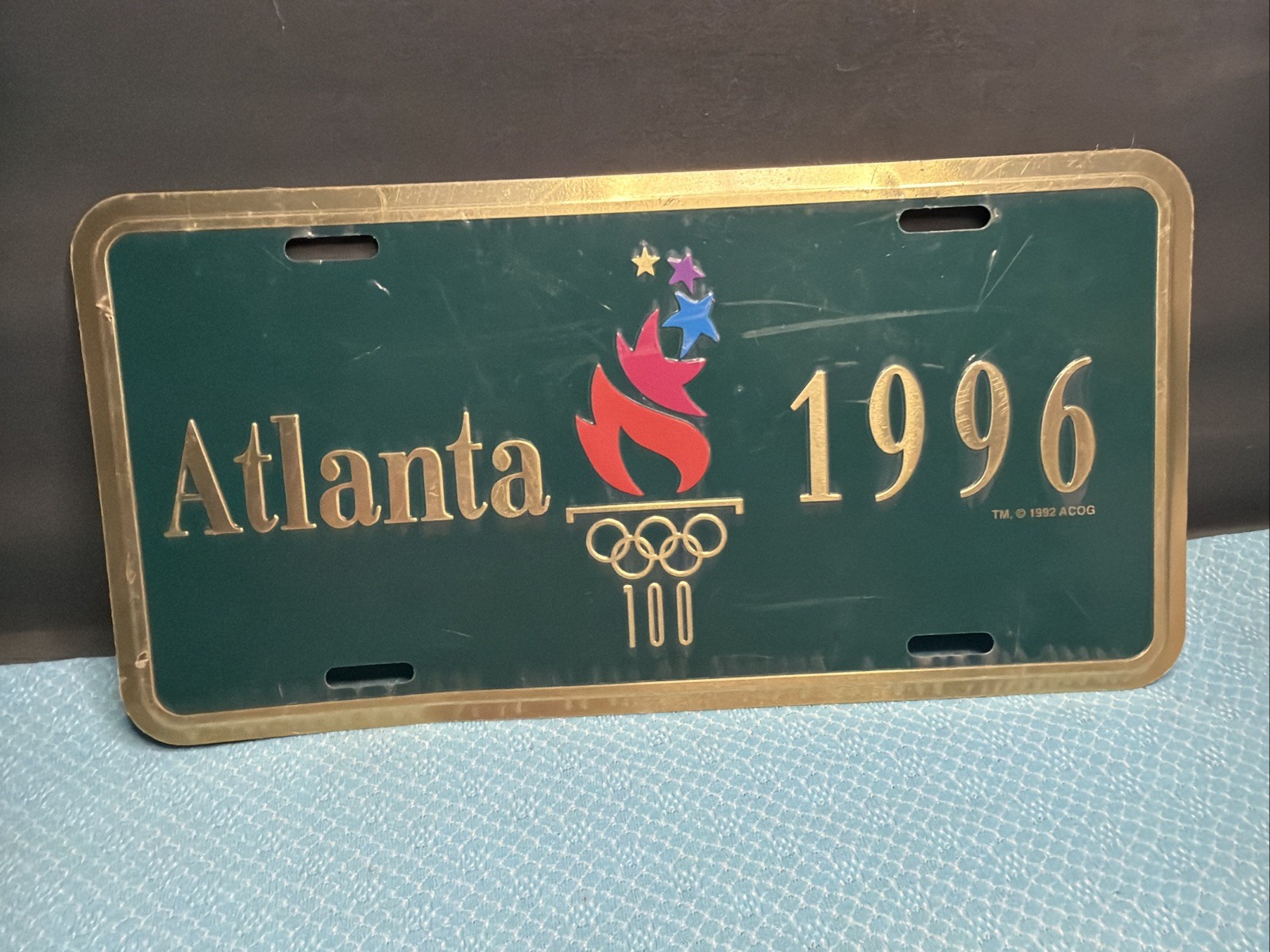Vintage Atlanta 1996 Olympics Metal License Plate Sign ACOG Sealed