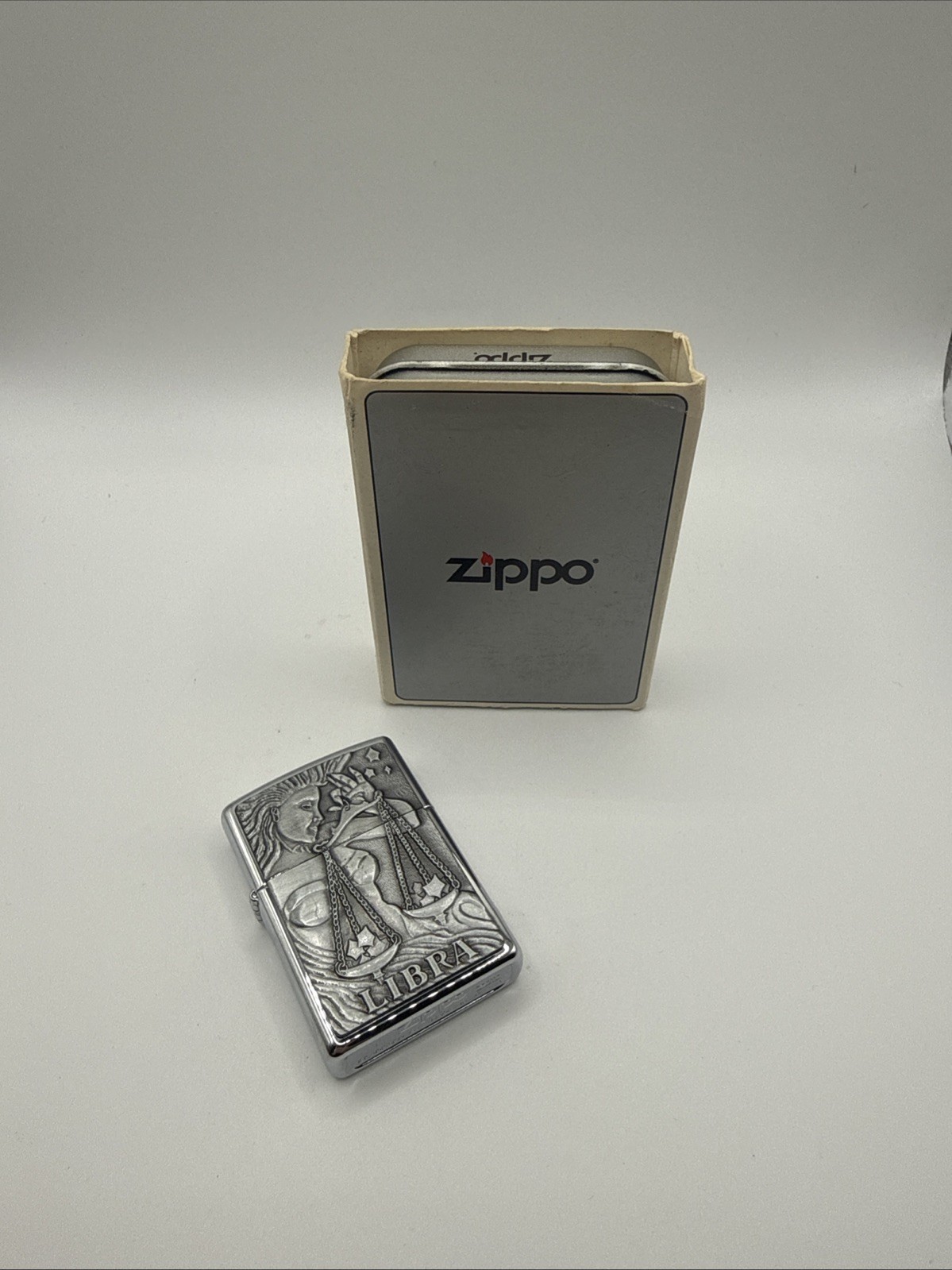 Barrett Smythe Zodiac Series Libra Brass Vintage Zippo Lighter, circa 1997 Barrett Smythe Zodiac Series Libra Brass Vintage Zippo Lighter, circa 1997