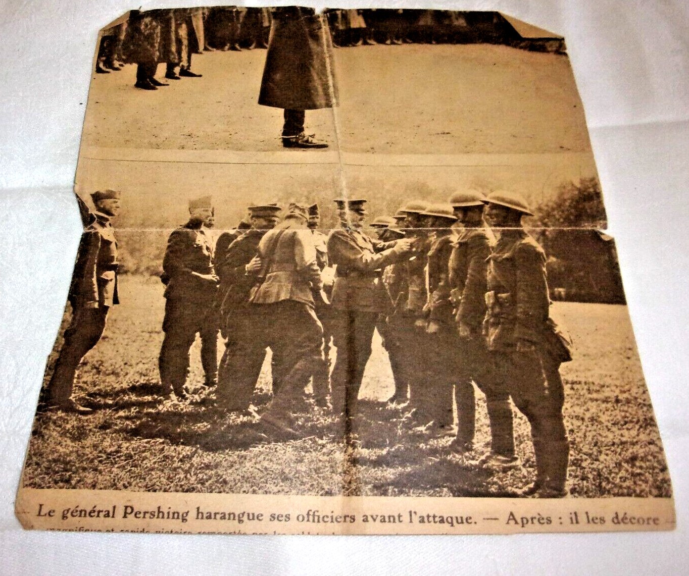 WORLD WAR 1 NEWSPAPER CLIPPING GEN JOHN PERSHING PINNING MEDAL ON FRENCH SOLDIER