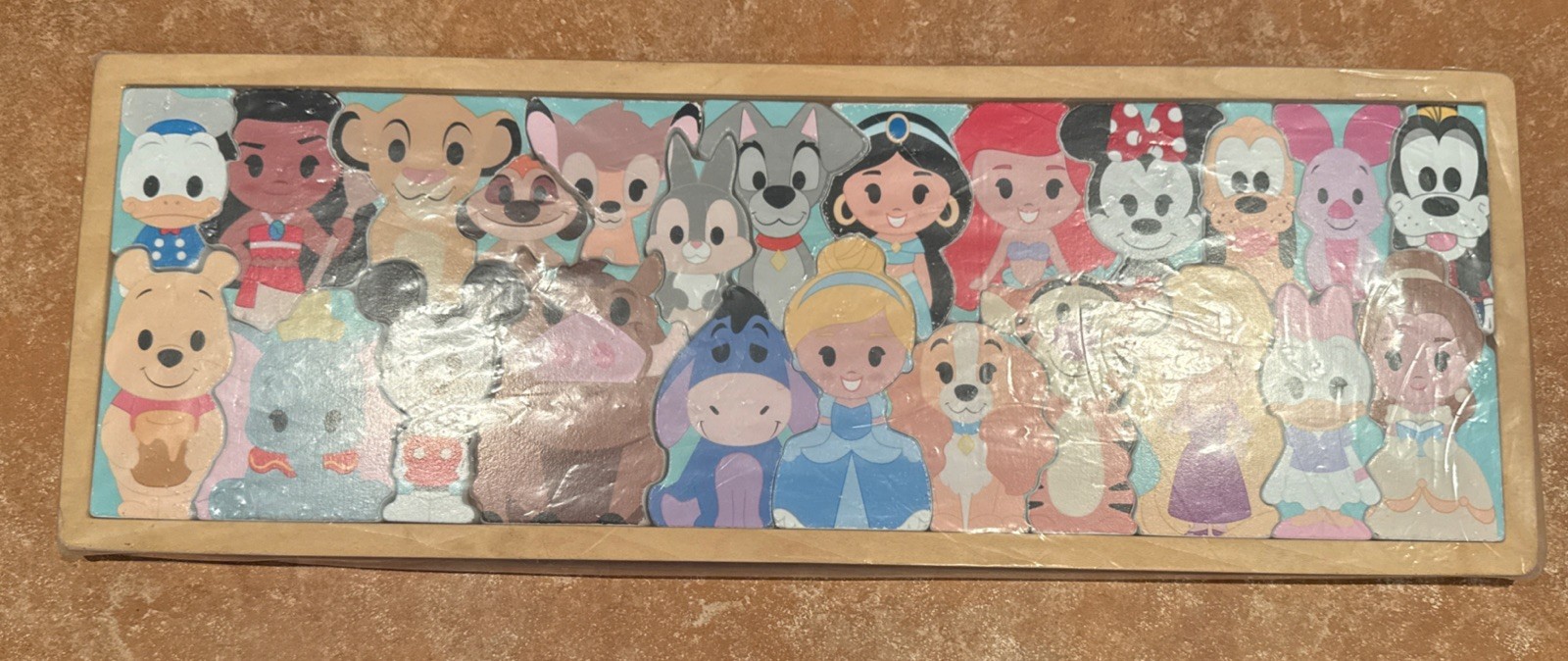Just Play Disney Characters Wooden 25 Piece Puzzle 20” By 6” Just Play Disney Characters Wooden 25 Piece Puzzle 20” By 6”