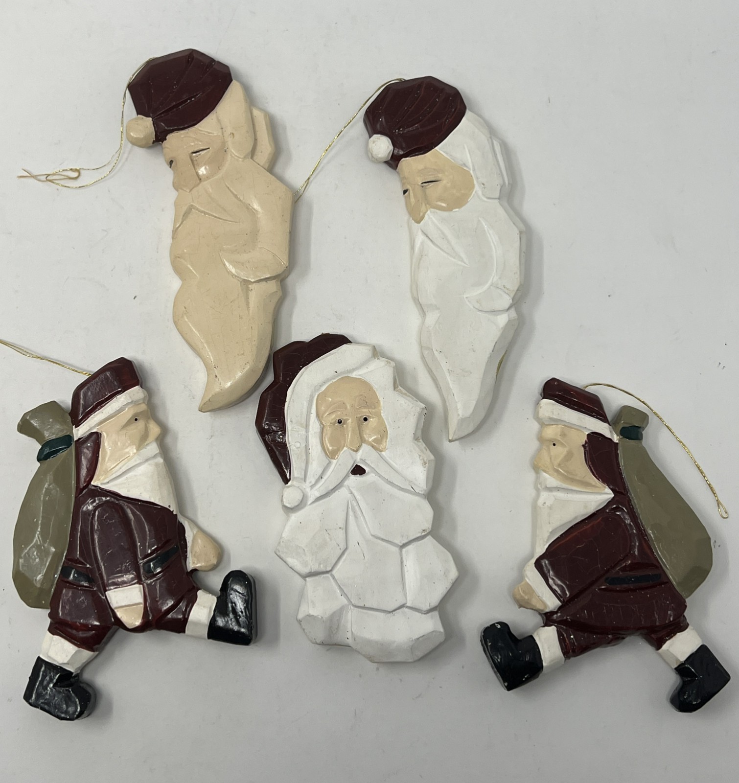 Vintage Collection of Carved Wood Santa Ornaments