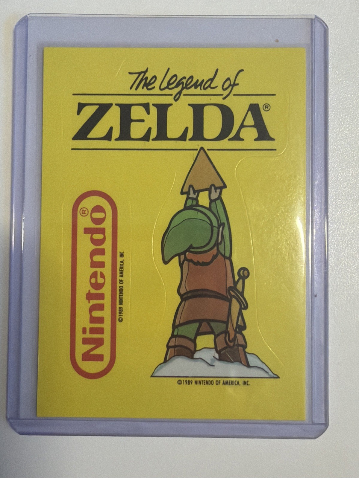 1989 Topps Nintendo #32 The Legend of Zelda Link Triforce Yellow Sticker Card 1989 Topps Nintendo #32 The Legend of Zelda Link Triforce Yellow Sticker Card