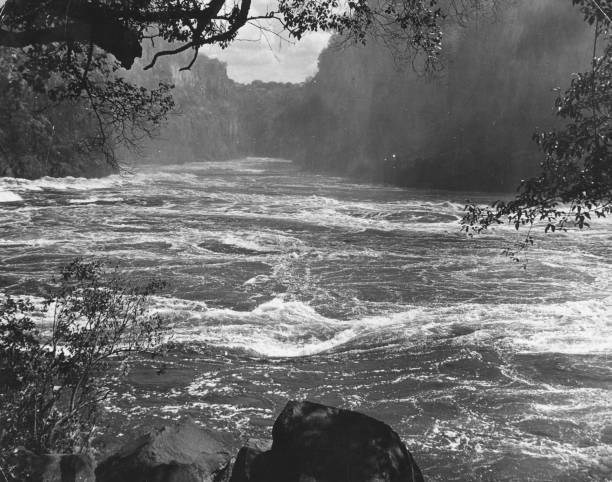 The swirling eddies and currents of the river zambezi at Victor- 1955 Old Photo