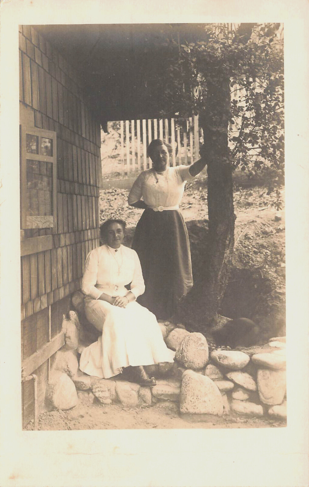 TWO WOMAN OUTSIDE ON ROCKS BY HOUSE PORTRAIT REAL PHOTO POSTCARD 1910s RPPC TWO WOMAN OUTSIDE ON ROCKS BY HOUSE PORTRAIT REAL PHOTO POSTCARD 1910s RPPC