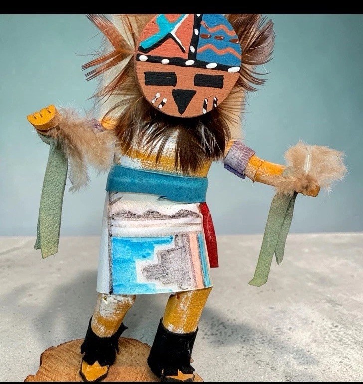Handcrafted wooden Kachina doll with feathers and fabric, signed by maker Handcrafted wooden Kachina doll with feathers and fabric, signed by maker