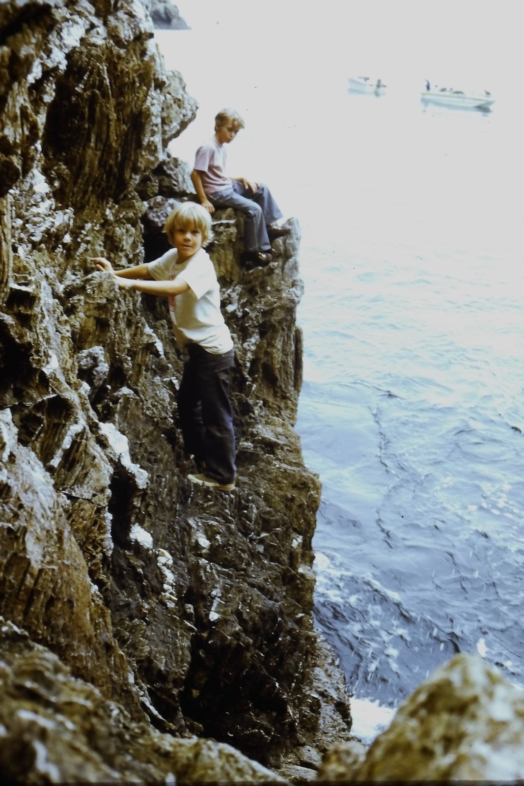 c1970\'s Kodachrome 35mm Slide, Boy Climbing Rocky Cliff Ocean Water blue c1970\'s Kodachrome 35mm Slide, Boy Climbing Rocky Cliff Ocean Water blue