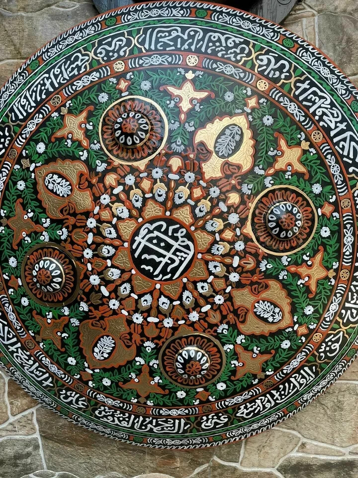 ORNATE WARRIOR SHIELD ARABIC INSCRIPTION FLOWER MOTIFS ISLAMIC SHIELD ORNATE WARRIOR SHIELD ARABIC INSCRIPTION FLOWER MOTIFS ISLAMIC SHIELD