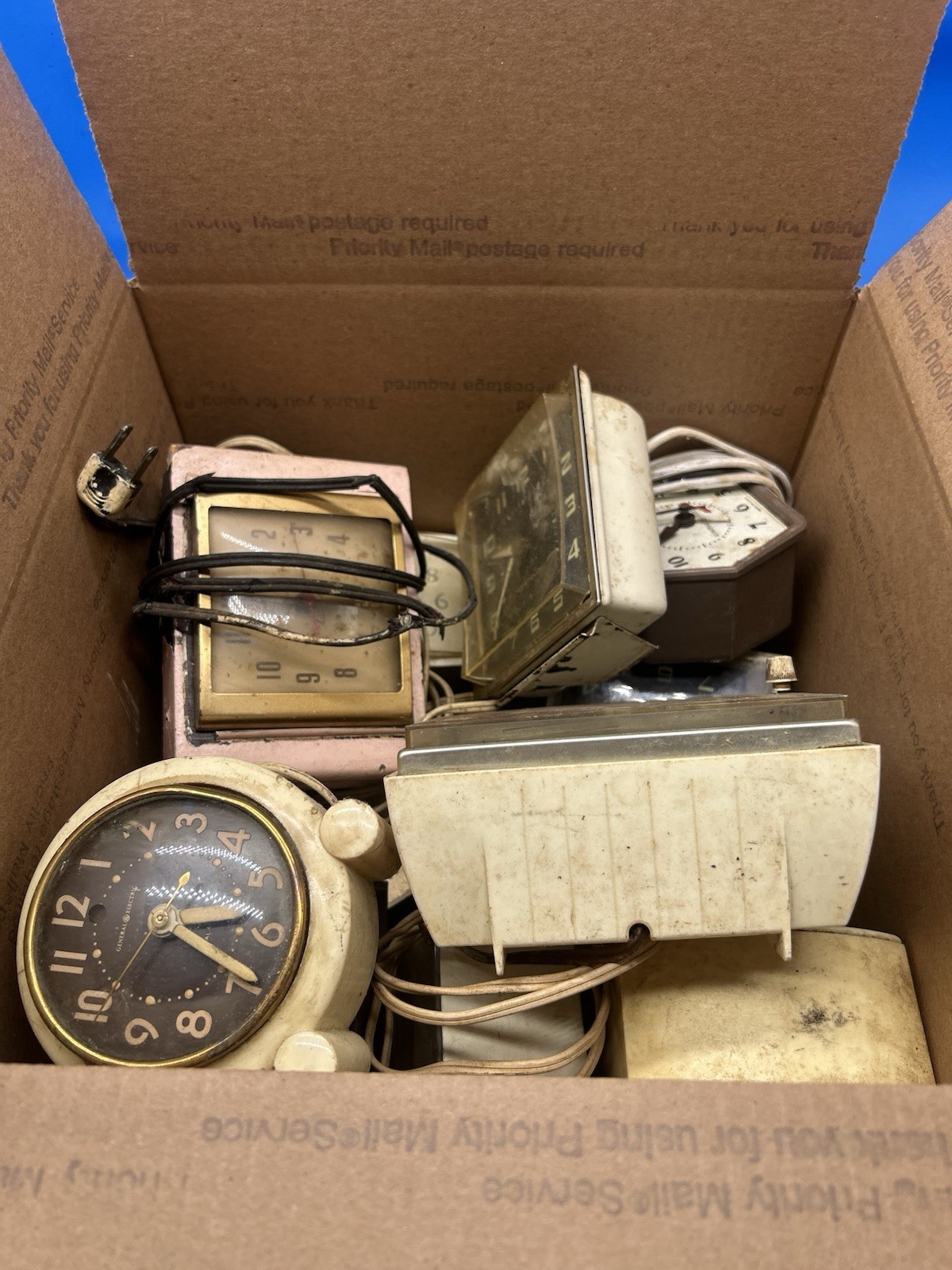 vintage mid-century General Electric (GE) and Telechron electric alarm clocks
