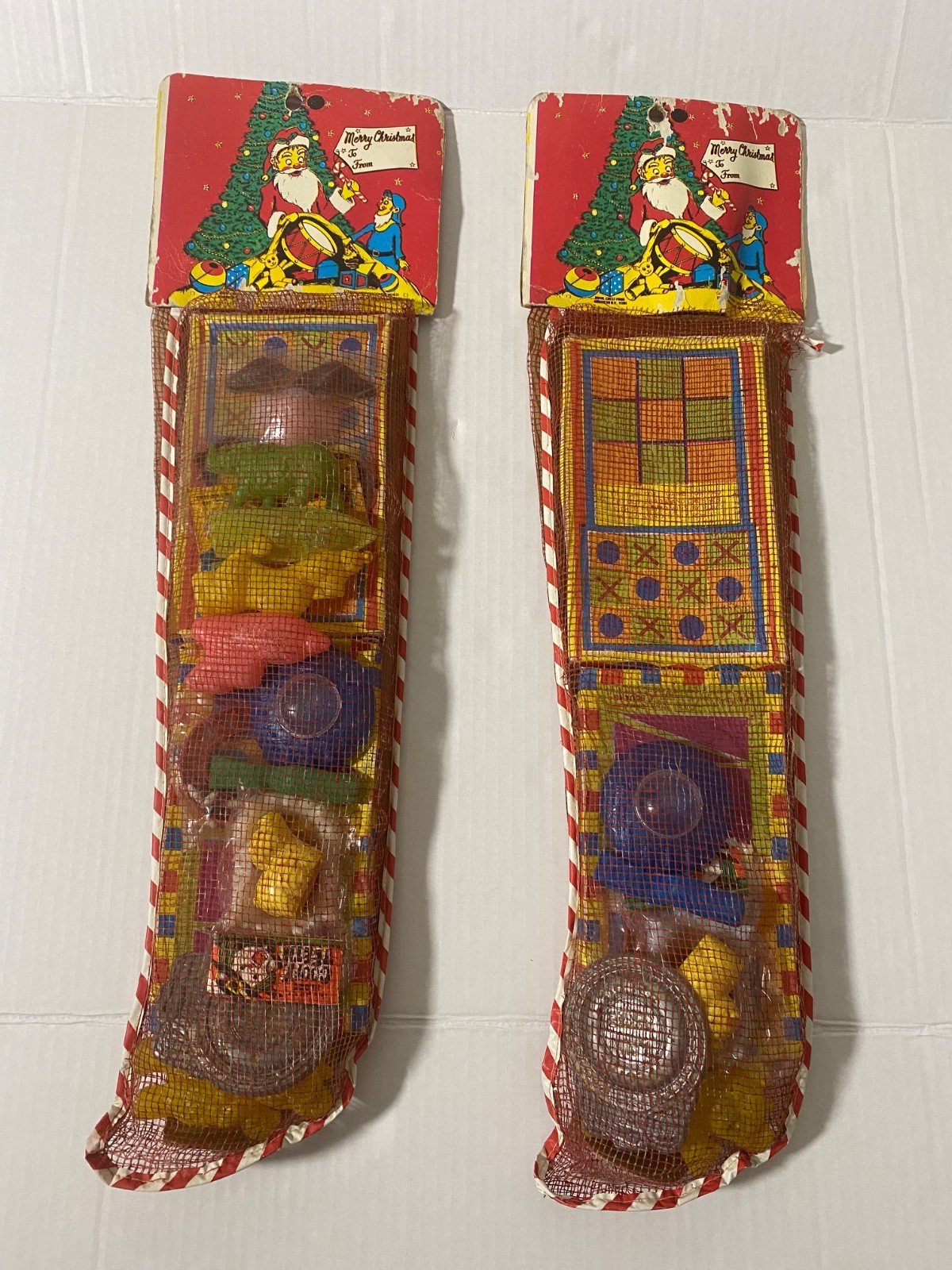 Vintage 1970\'s Dime Store Toy Filled Mesh Christmas Stockings Set of 2 Vintage 1970\'s Dime Store Toy Filled Mesh Christmas Stockings Set of 2
