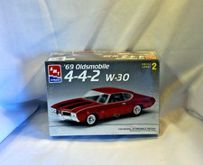 AMT OLDSMOBILE '69 Cutlass 4-4-2 W-30 model kit NEW in FACTORY SEALED BOX picture