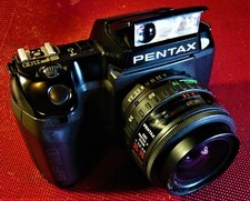 Pentax SF10 35mm /w Pentax Zoom Lens 35-70 F 3.5 AF. More versatile than K1000. picture