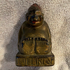 Vintage Cast Metal Seated Figure Still Coin Bank Coin Slot Screw Opening picture
