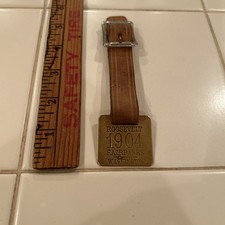 Antique 1904 Teddy Roosevelt Brass Watch Fob with Leather Strap Beautiful picture