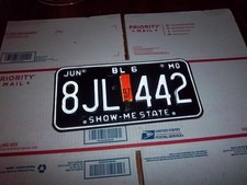 vintage 1997 missouri 8JL-442 show-me state license plate picture