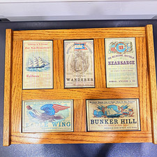 Vintage wall art 19th-century clipper ship ads on a handcrafted wood frame. picture